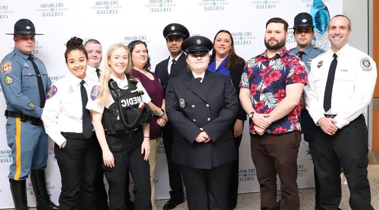 Paramedic program graduates gathered in a group at the ceremony