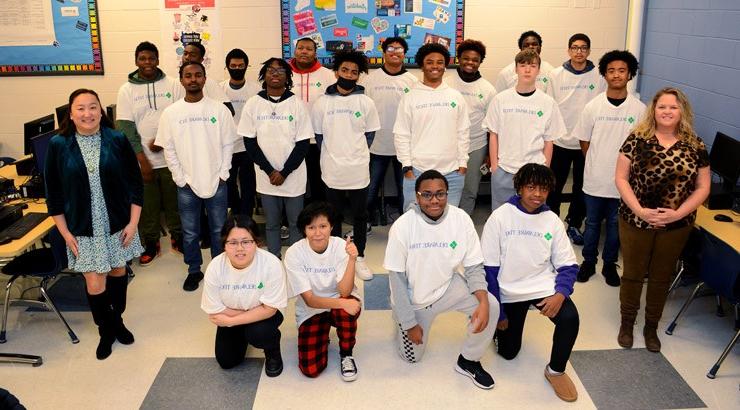 Students from 1+1 IT program with instructors Dawnn Dickerson, CNAP instructor, Howard High School of Technology (left) and Erin Schutt, academic counselor, Delaware Tech (right).